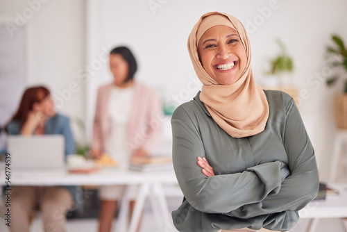 Leadership, business and portrait of Muslim woman in office, crossed arms for success in business meeting. Teamwork, diversity and Islamic employee work with team on strategy, planning and project photo