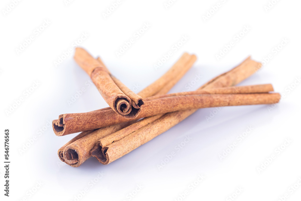 cinnamon on white background front view close up. cinnamon on white background front view close up.