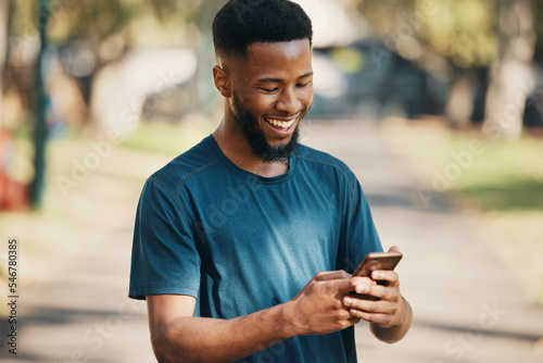 Happy, black man and smartphone in city, for communication and outdoor for social media. African American male, smile and cellphone for chatting, browse online and search internet with happiness.