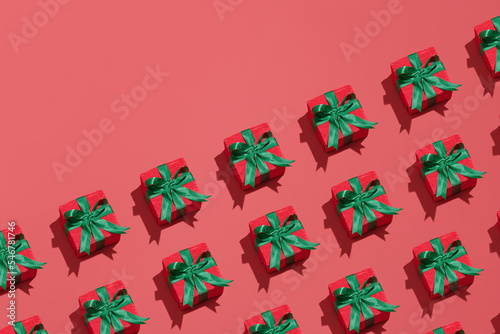 Christmas or Valentine's day gift boxes on red background