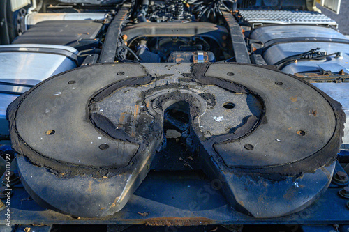 close-up of the support or hitch point of a truck trailer on the back of the tractor unit, on the wheels, in a circular shape in a hole for the spike to enter, dry, without grease, as in disuse transp