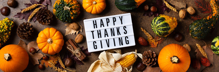 Autumn fall thanksgiving day composition with decorative pumpkins, banner