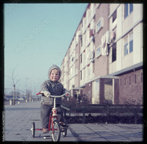 toddler on tricycle photo