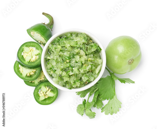 Bowl of fresh green salsa sauce on white background