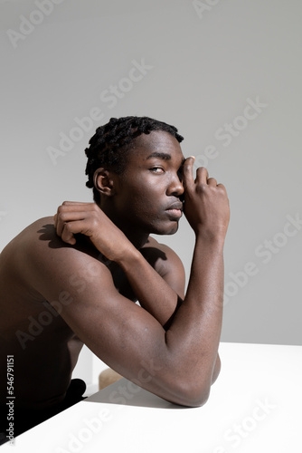 Portrait of a black man on a gray background photo