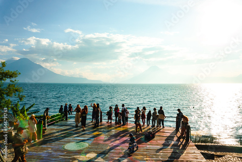 People watching the sunset on Lake Atitlan, Guatemala