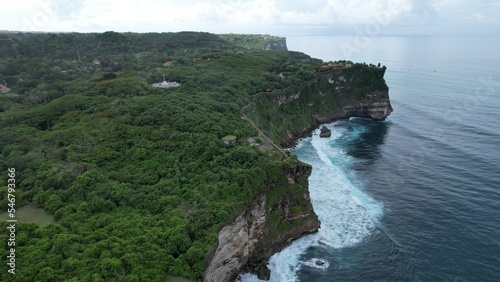 Bali, Indonesia - November 7, 2022: The Beaches and Cliffs of Uluwatu Bali Indonesia photo