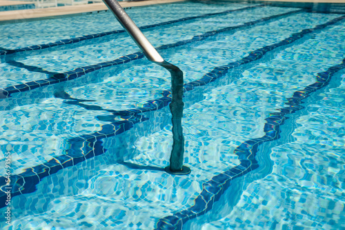 Blue water in swimming pool