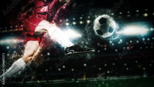 Fototapeta Naklejka Na Ścianę i Meble -  Game action with light effects of a footballer hitting the ball with force