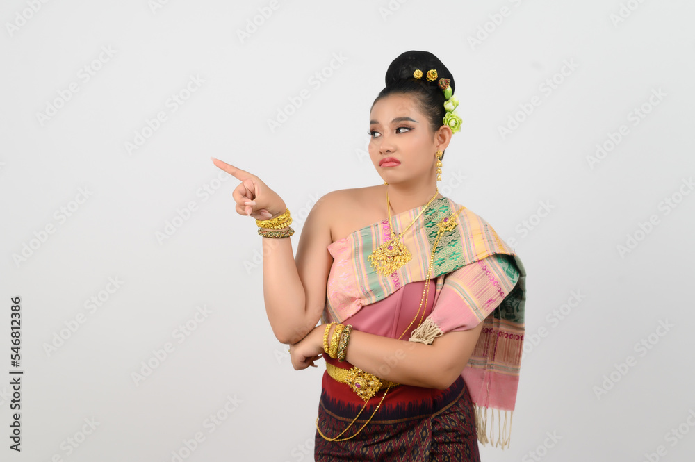 Young beautiful woman dress local culture in norteasthern point finger posture Young beautiful woman dress local culture in norteasthern point finger posture