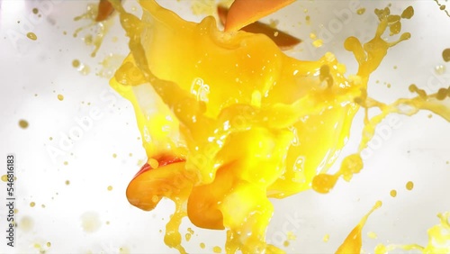 Slow Motion of Explosion Mango Slices and Burst Juice photo