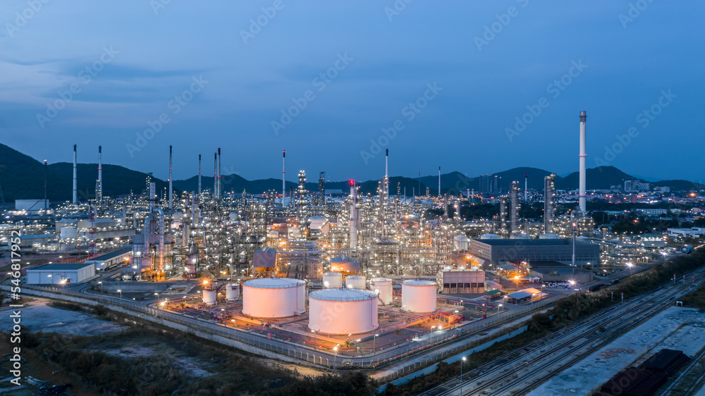 Aerial view Oil and gas industrial, Oil refinery plant form industry, Refinery factory white oil storage tank, Oil refinery plant from industry zone.