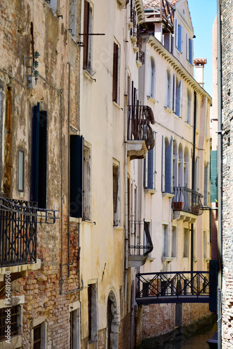 Narrow street and old buildings  Venice  Italy