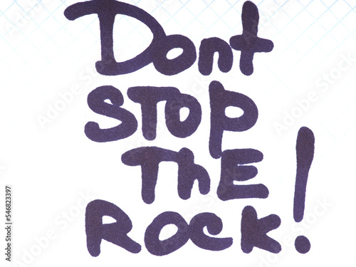 The concept of rock music. The inscription on a piece of paper dont stop the rock photo