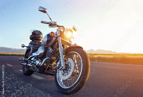Fotografie, Obraz biker on the road in sunset