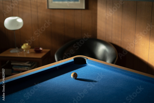 Ball in shadow on pool table