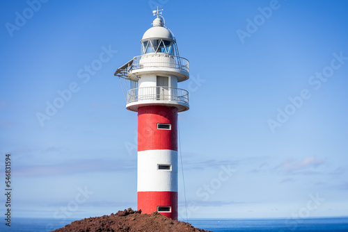 A lighthouse of the cape Teno. Tenerife. Canary Islands. Spain. Art lens. Swirl bokeh. Focus on the center.