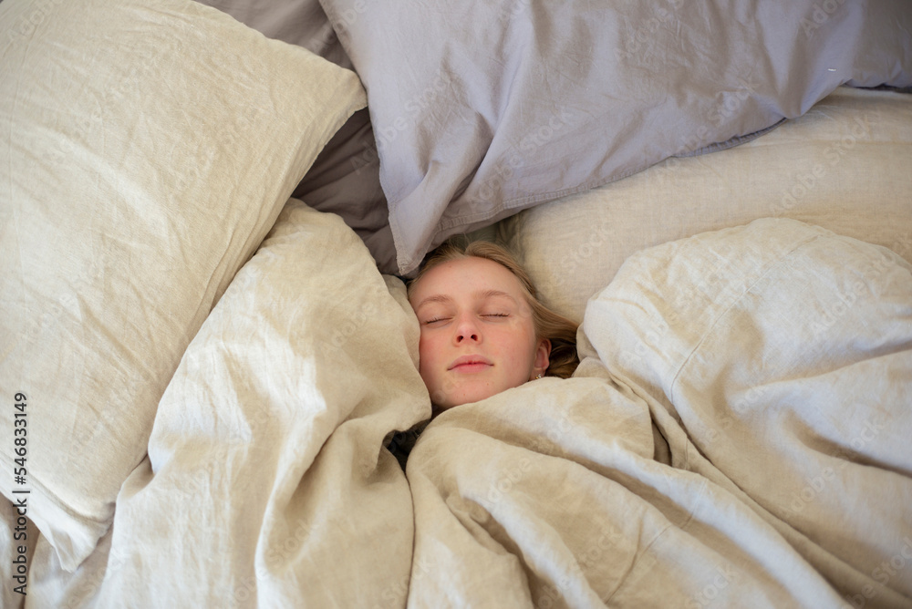 Teenage girl sleeping in bed Teenage girl sleeping in bed