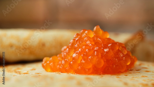 red caviar on pancakes close-up, shallow depth of field