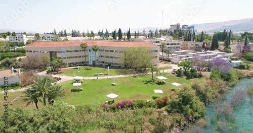 Israel, Sea of Galilee, Kinneret Academic college - 8 MAY 2022: Aerial View of a college building by the lake,. photo