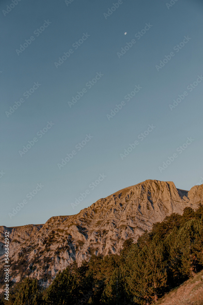 Naklejka premium mountain landscape with the moon