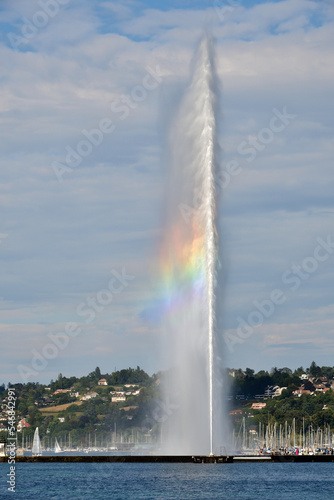 Switzerland, Geneva. A rainbow over the Jet d'Eau (Water-Jet) on Lake Geneva. August 15, 2022.