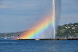 Switzerland, Geneva. A rainbow over the Jet d'Eau (Water-Jet) on Lake Geneva. August 15, 2022.