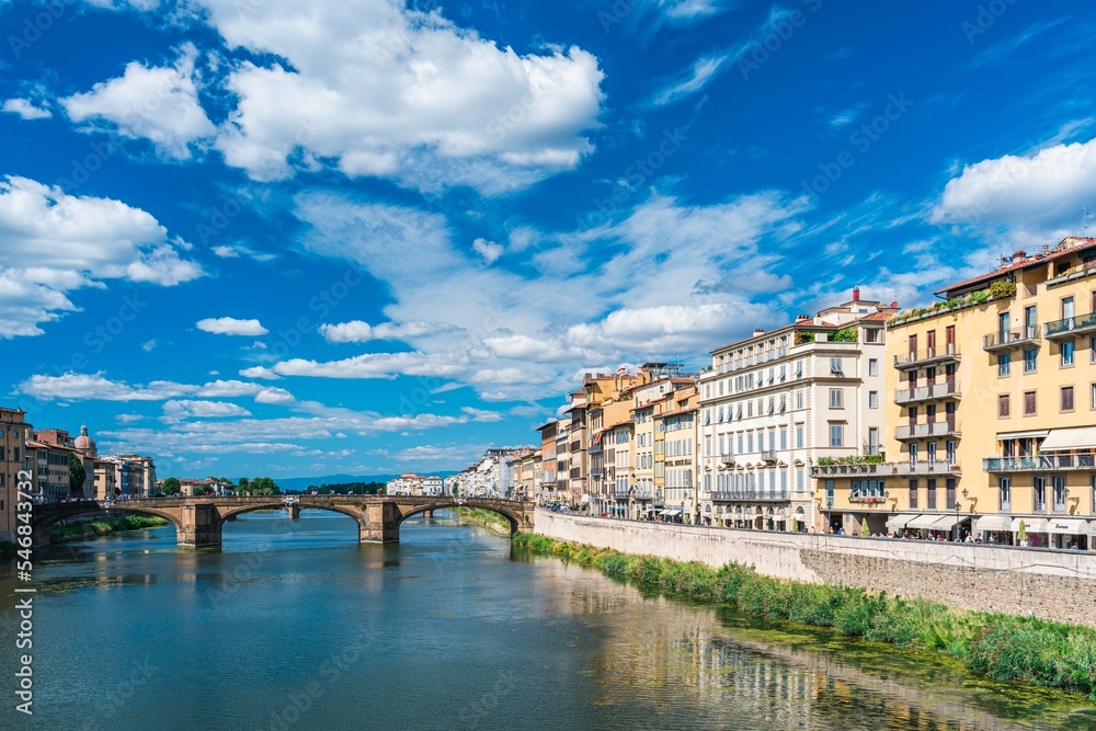 Fototapeta premium St Trinity Bridge from Ponte Vecchio over Arno River, Florence, Italy, Europe