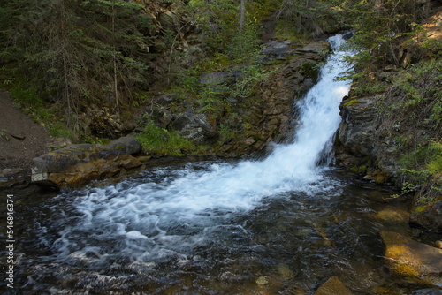 Fototapeta Naklejka Na Ścianę i Meble -  Waterfall on Canmore Creek at Canmore,Alberta,Canada,North America
