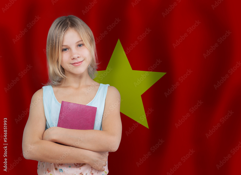 Teen girl student on Vietnamese flag background. Education and school in Vietnam concept. Teen girl student on Vietnamese flag background. Education and school in Vietnam concept.