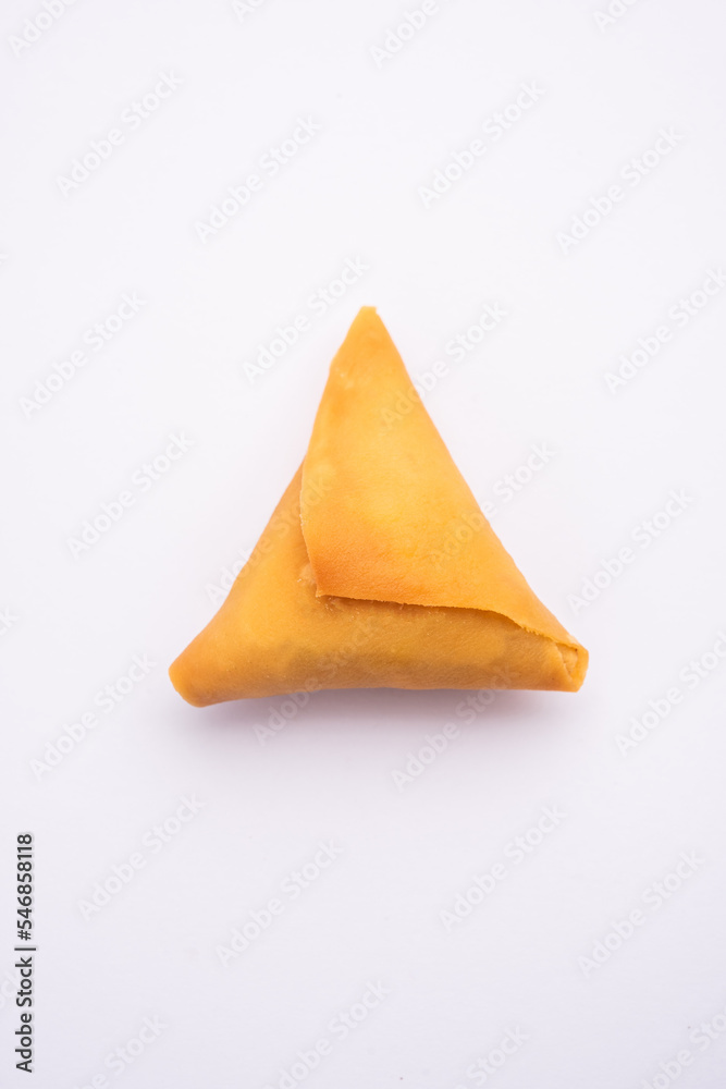 cocktail mini triangle samosa made using patti or strip, popular home made snack from India cocktail mini triangle samosa made using patti or strip, popular home made snack from India
