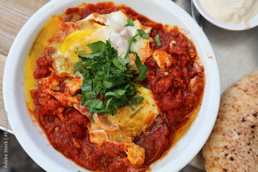 Israeli food - shakshuka poached eggs Israeli food - shakshuka poached eggs