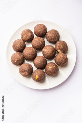 Nachni laddu or Ragi laddoo or sweet balls made using finger millet, jaggery and ghee photo