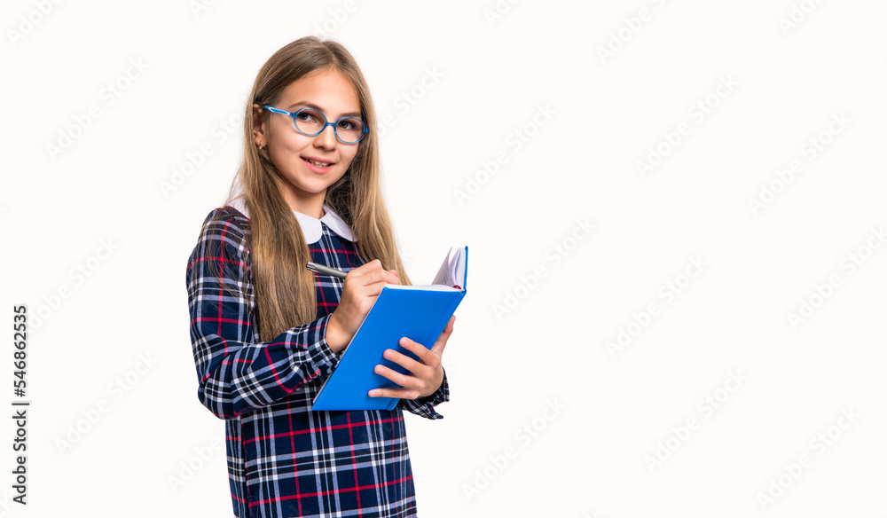 photo of school teen noting girl making notes, copy space. school girl in noting notes photo of school teen noting girl making notes, copy space. school girl in noting notes