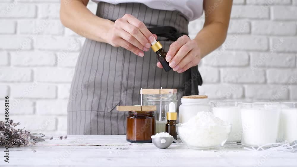 woman making handmade candles, preparing the workspace