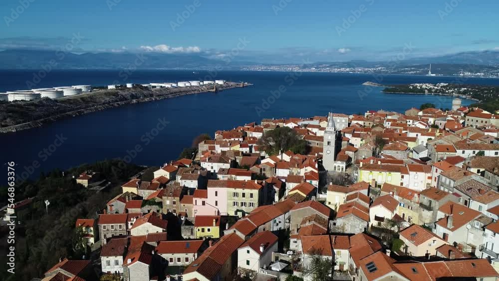 Aerial view of Omisalj, a Village on hill overlooking the storage facilities, Croatia. Aerial view of Omisalj, a Village on hill overlooking the storage facilities, Croatia.