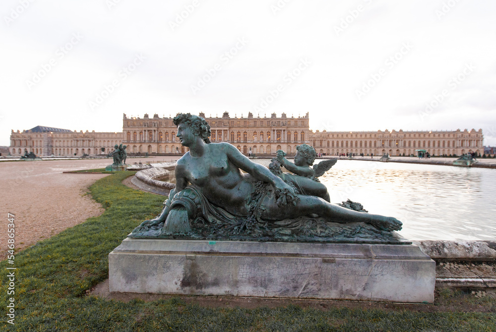 Versailles France sculptures in the courtyard of the castle, facade architecture.