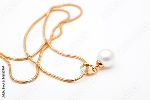 close up gold chain, pendant, precious stones, diamonds, costume jewelry, jewelry.