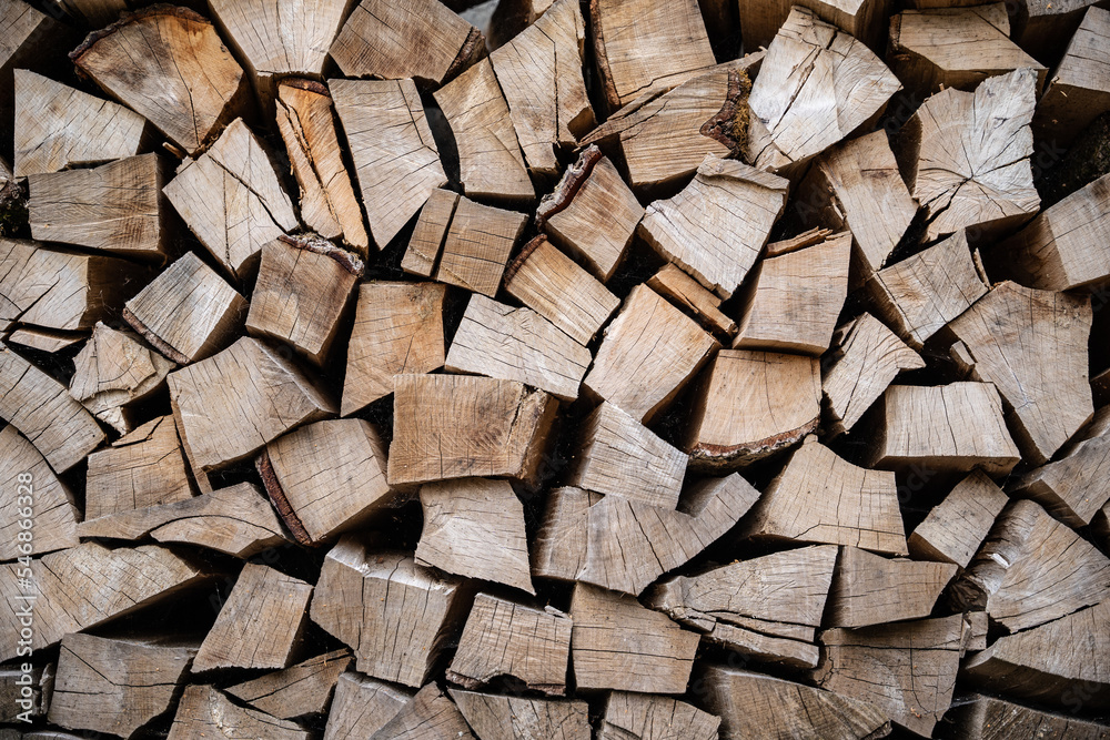 beautifully stacked firewood, natural wood for burning in the furnace beautifully stacked firewood, natural wood for burning in the furnace