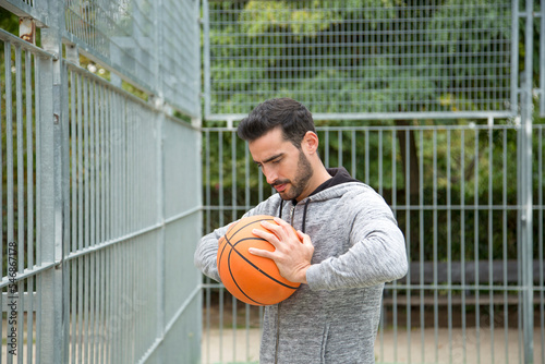 Man warming up to play basketball