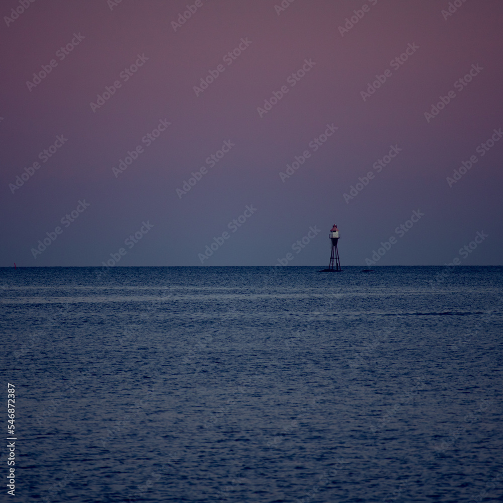 lighthouse at sunset Norway