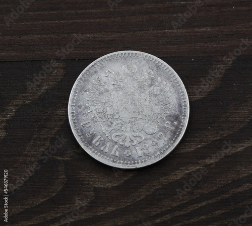 Rare Russian silver coin one ruble on wooden table