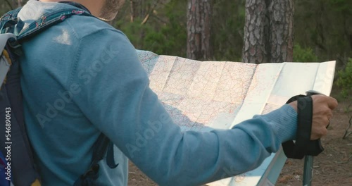 Wallpaper Mural Crop male traveler reading map Torontodigital.ca