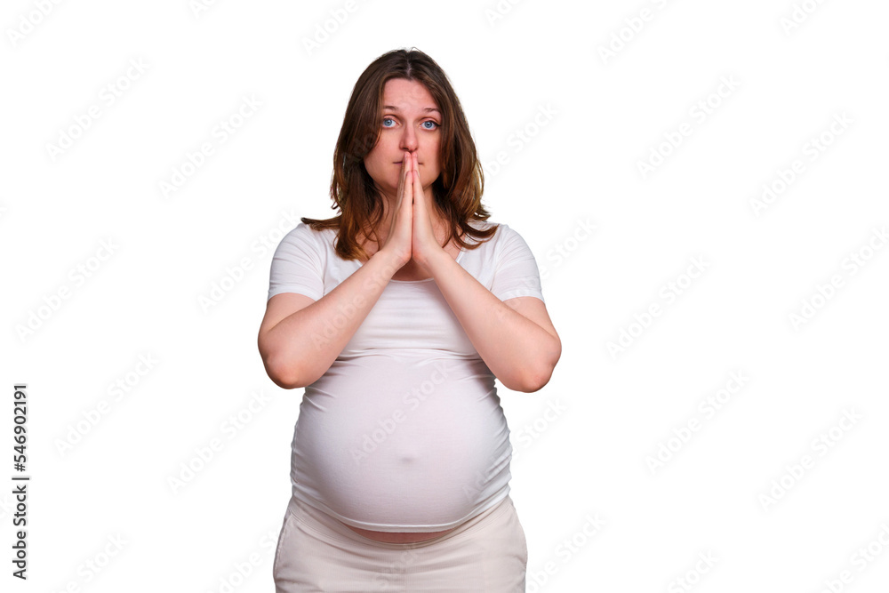 Prayer gesture with hands of pregnant woman, studio shot on white background Prayer gesture with hands of pregnant woman, studio shot on white background