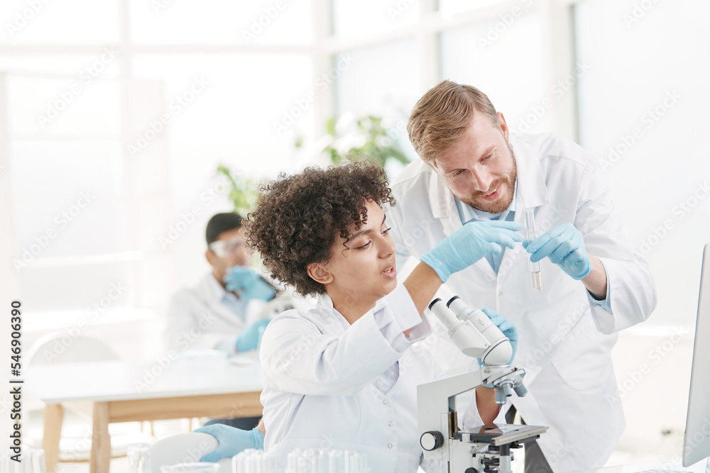 specialists work in the laboratory of medical research.
