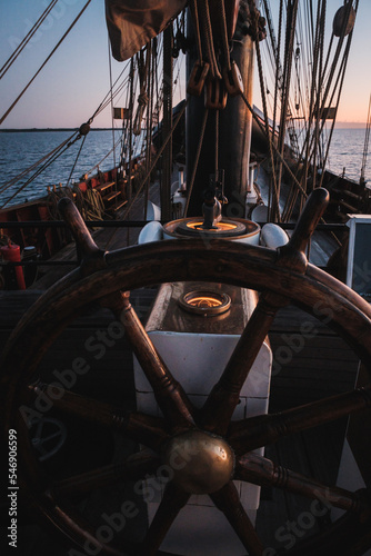Rudder of an old sailing vessel at sunset