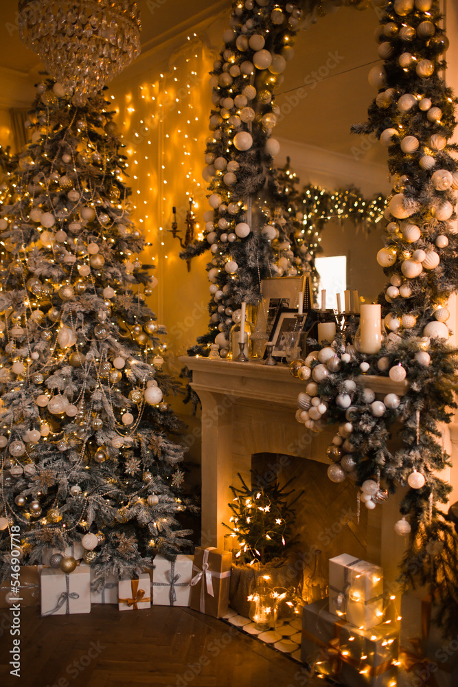 warm and cozy evening in Christmas room interior design,Xmas tree decorated by lights presents gifts,toys, deer,candles, lanterns, garland lighting indoors fireplace.holiday living room.magic New year warm and cozy evening in Christmas room interior design,Xmas tree decorated by lights presents gifts,toys, deer,candles, lanterns, garland lighting indoors fireplace.holiday living room.magic New year