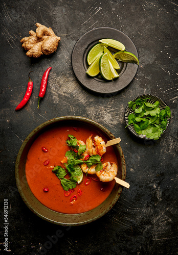 Pumpkin soup with grilled prawns