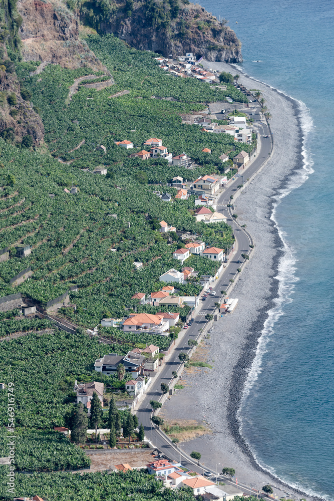 banana tree cultivations and black beach on southern Atlantic shore at Ponta do Sol, Madeira