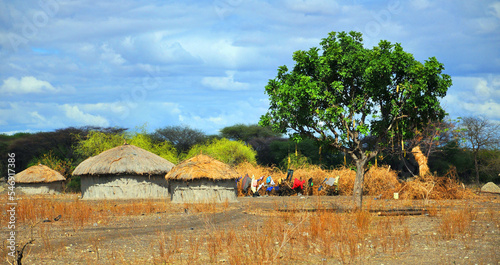 Masai village Tanzania: Many Maasai tribes throughout Tanzania and Kenya welcome visits to their village to experience their culture, traditions, and lifestyle. photo